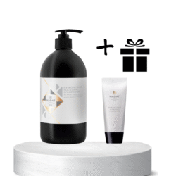 Large black pump bottle of conditioner on a white pedestal, beside a small tube and a gift icon indicating a bundle.