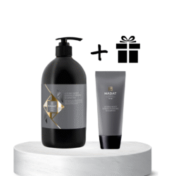 Two Hadat haircare products (shampoo bottle and tube) displayed on a white pedestal with a gift icon indicating a gift offer or bundle.