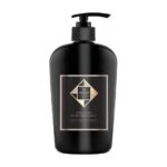 Hadat HydroSpa Hair Treatment bottle with black glossy finish and pump dispenser, gold geometric label