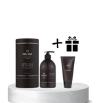 Hadat cosmetics products (three dark bottles/tubes) on a white marble pedestal, with a plus sign and a gift icon indicating a promo offer