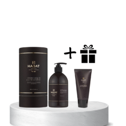 Hadat cosmetics products (three dark bottles/tubes) on a white marble pedestal, with a plus sign and a gift icon indicating a promo offer