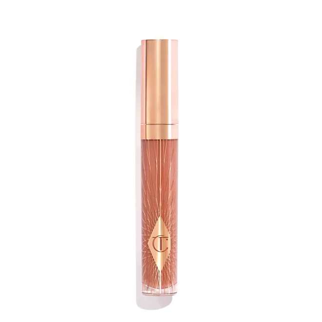 Lip gloss tube in a rose-gold cap with a pink-brown shade, standing upright on white background.