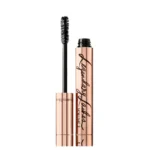 Rose-gold mascara tube with its wand lifted beside it, on a white background.