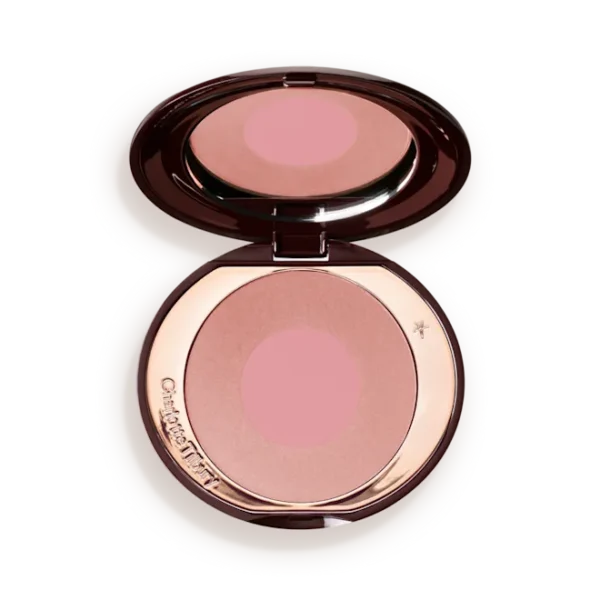 Open round makeup compact with pink pressed powder blush and mirror reflection inside.