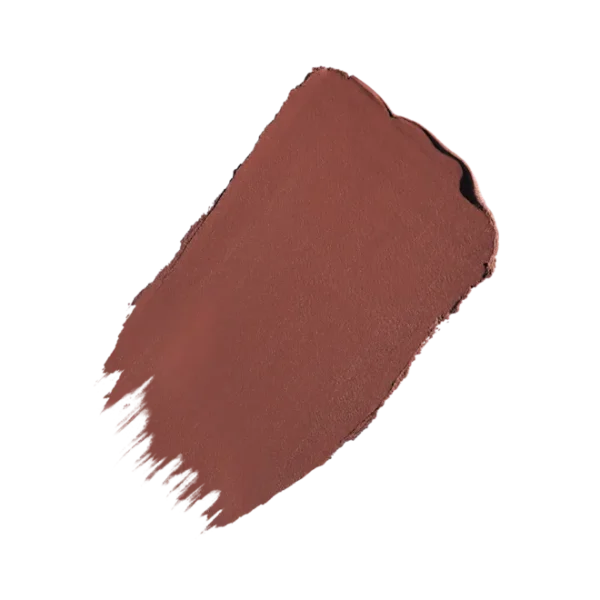 Swatch of brick-red lipstick on a white background showing rich terracotta color