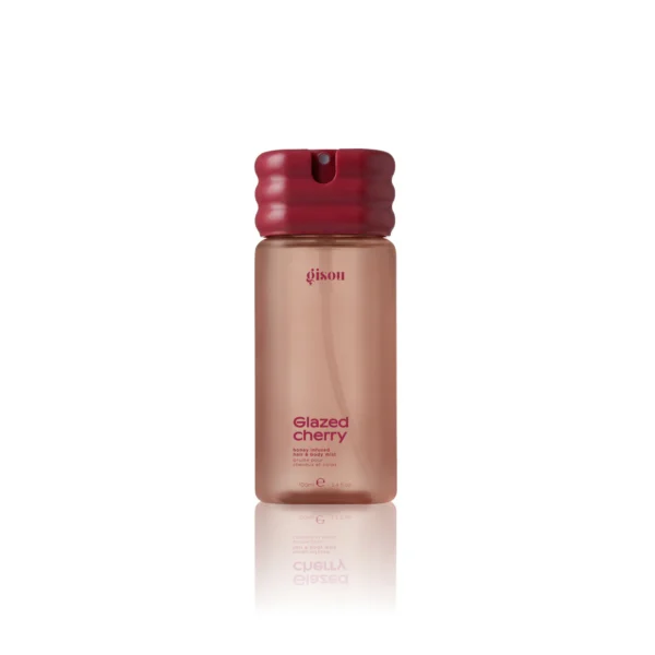 Gisou Glazed Cherry hair and body mist bottle with pink cap and rose-gold body.