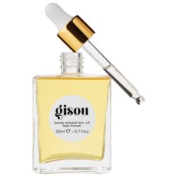 Glass bottle of GISOU honey-infused hair oil with a white dropper and gold cap, against a white background, showing pale yellow oil inside (20 ml).