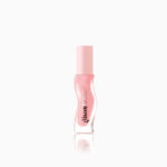 Pink nail polish bottle with a light pink cap, curved glass body, brand name 'disoul' visible.