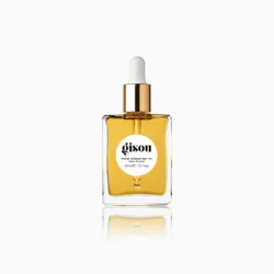 Gisou honey-infused hair oil bottle with white dropper cap and gold collar, shown against a white background.