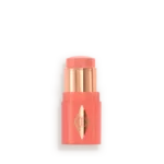 Coral lipstick in a coral–pink case with a gold cap and emblem