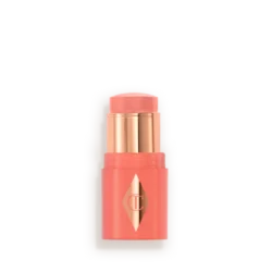 Coral lipstick in a coral–pink case with a gold cap and emblem