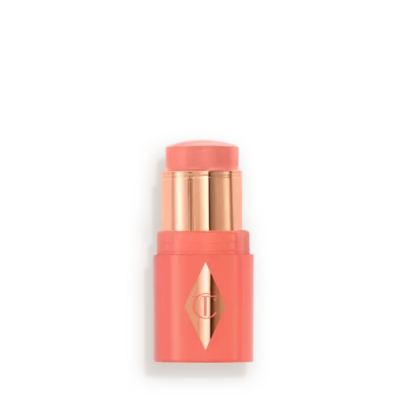 Coral lipstick in a coral–pink case with a gold cap and emblem