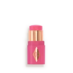 Pink lipstick in a bright pink case with gold inner tubes and a diamond logo on the front, ready to apply