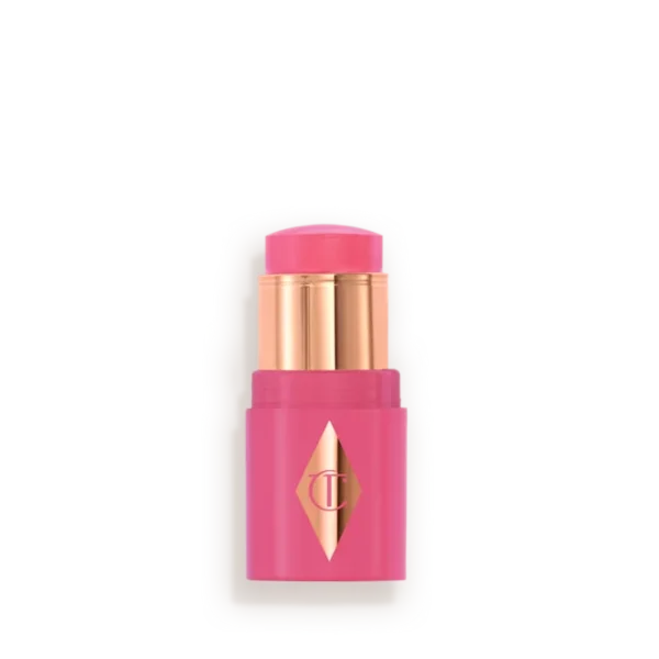Pink lipstick in a bright pink case with gold inner tubes and a diamond logo on the front, ready to apply