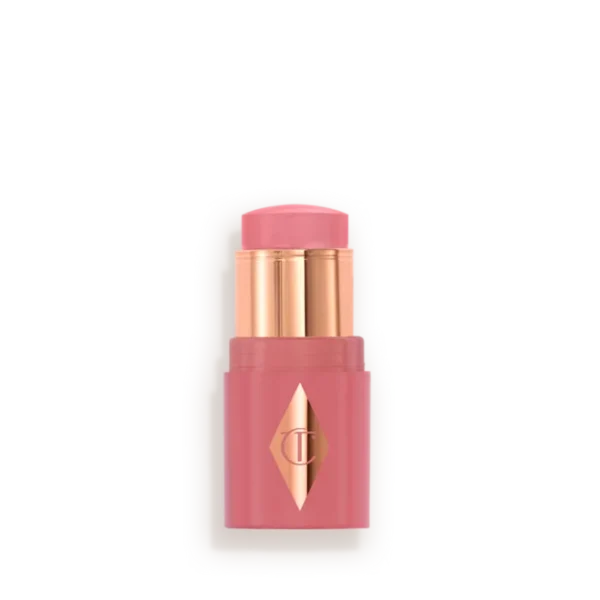 Pink lipstick in a pink case with gold accents and a diamond-shaped logo on the front (cosmetic product).