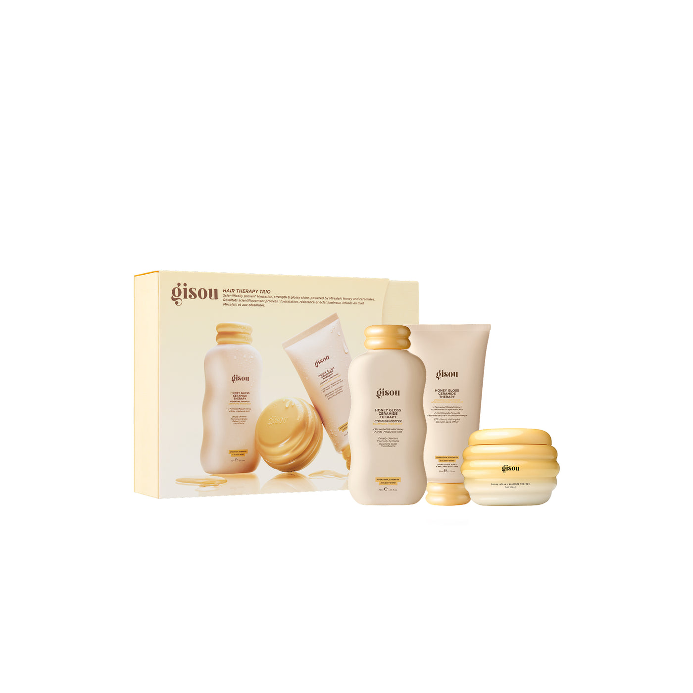 SelfLove26-SET-B-PDP-02-DTC - shopcosmoprof.com Gisou hair care gift set showing boxed products and several beige-gold bottles and jars arranged together