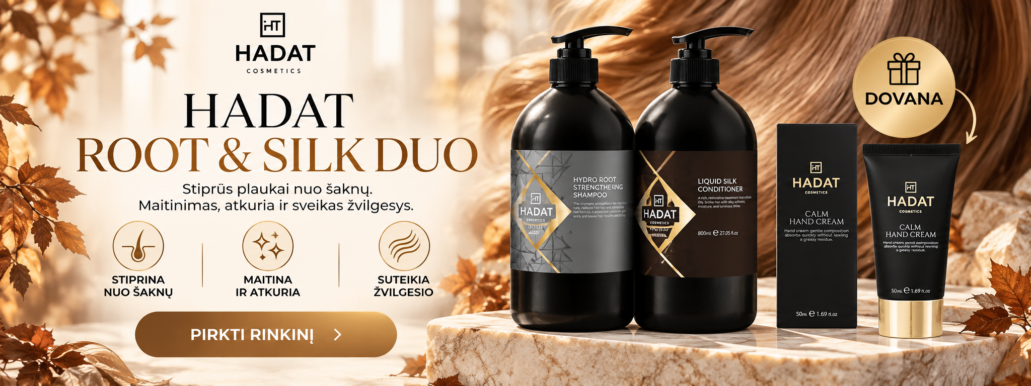 baneris trys - shopcosmoprof.com Hero banner for Hadat Cosmetics featuring Root & Silk Duo with two black shampoo and conditioner bottles, hand cream, and a gift badge on the right; autumn leaves backdrop and a warm beige gradient.