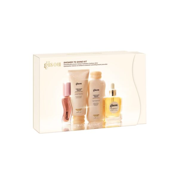 Gisou Shower to Shine Kit box displaying assorted beige-pink hair care bottles inside a cream gift box.