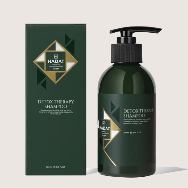 Detox Therapy Shampoo by Hadat shown as a dark green bottle with pump and matching box on a light background.
