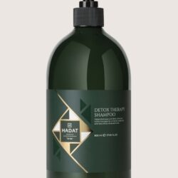 Dark green Detox Therapy Shampoo bottle with black pump, Hadat Cosmetics label and gold geometric design (800 ml).