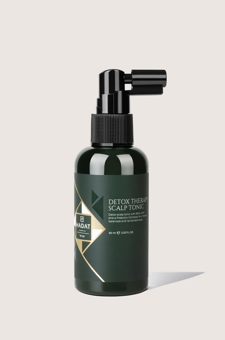 112540_DETOX THERAPY SCALP TONIC - shopcosmoprof.com Dark green spray bottle labeled Detox Therapy Scalp Tonic with black spray nozzle.