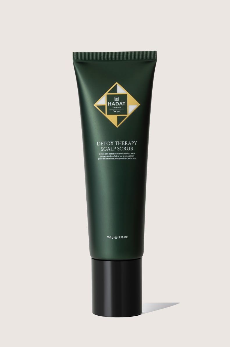 179000_DETOX THERAPY SCALP SCRUB - shopcosmoprof.com Dark green squeeze tube of Hadat Detox Therapy Scalp Scrub with a black cap, front label visible. Weight 150 g (5.29 oz).