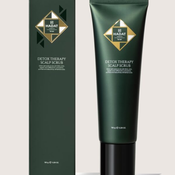 Dark green Hadat Detox Therapy Scalp Scrub box and tube, with gold diamond emblem, product name visible in white text on a light beige background.