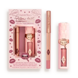 PILLOW_TALK_PLUMPGASM_LIP_KIT_Original_-_openpng - shopcosmoprof.com Charlotte Tilbury Pillow Talk lip kit in pink packaging with lip liner, lipstick, and gloss in rose-gold tubes.