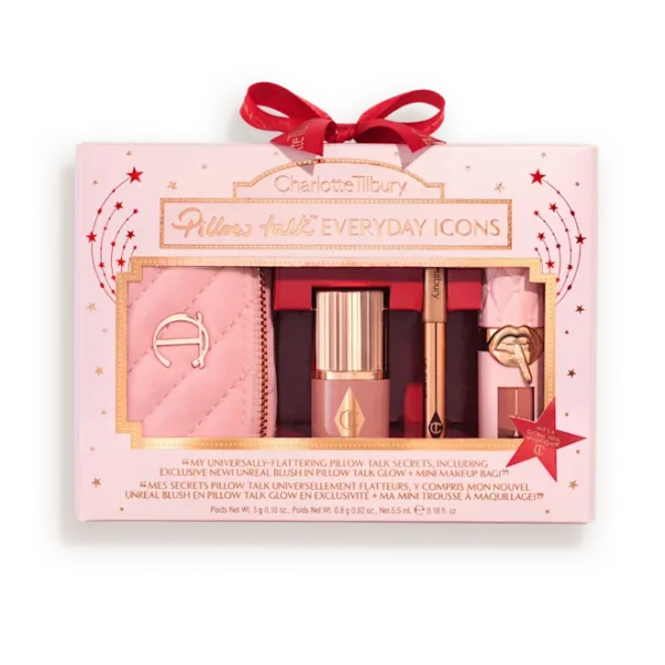 Charlotte Tilbury Pillow Talk Everyday Icons gift set in a pink quilted pouch with makeup items and a red bow box.