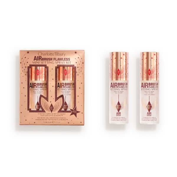 Boxed Charlotte Tilbury Airbrush Flawless Setting Spray mini kit with two bottles in a peach-toned package.