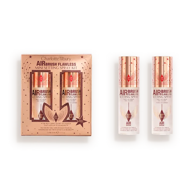 Boxed Charlotte Tilbury Airbrush Flawless Setting Spray mini kit with two bottles in a peach-toned package.