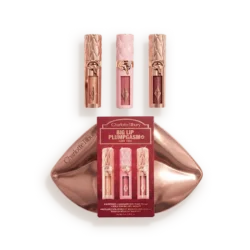 Charlotte Tilbury Big Lip Plump & Mini Trio lip kit with three pink-rose lipsticks in rose-gold tubes on a metallic tray