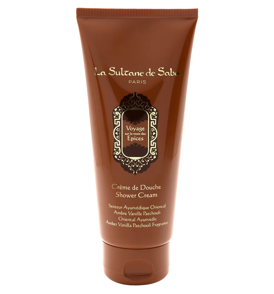 cremedouche_epices_AR003445_1png - shopcosmoprof.com La Sultane de Saba shower cream tube with amber-brown packaging and ornate label reading Voyage sur la route des Epices, Crème de Douche.